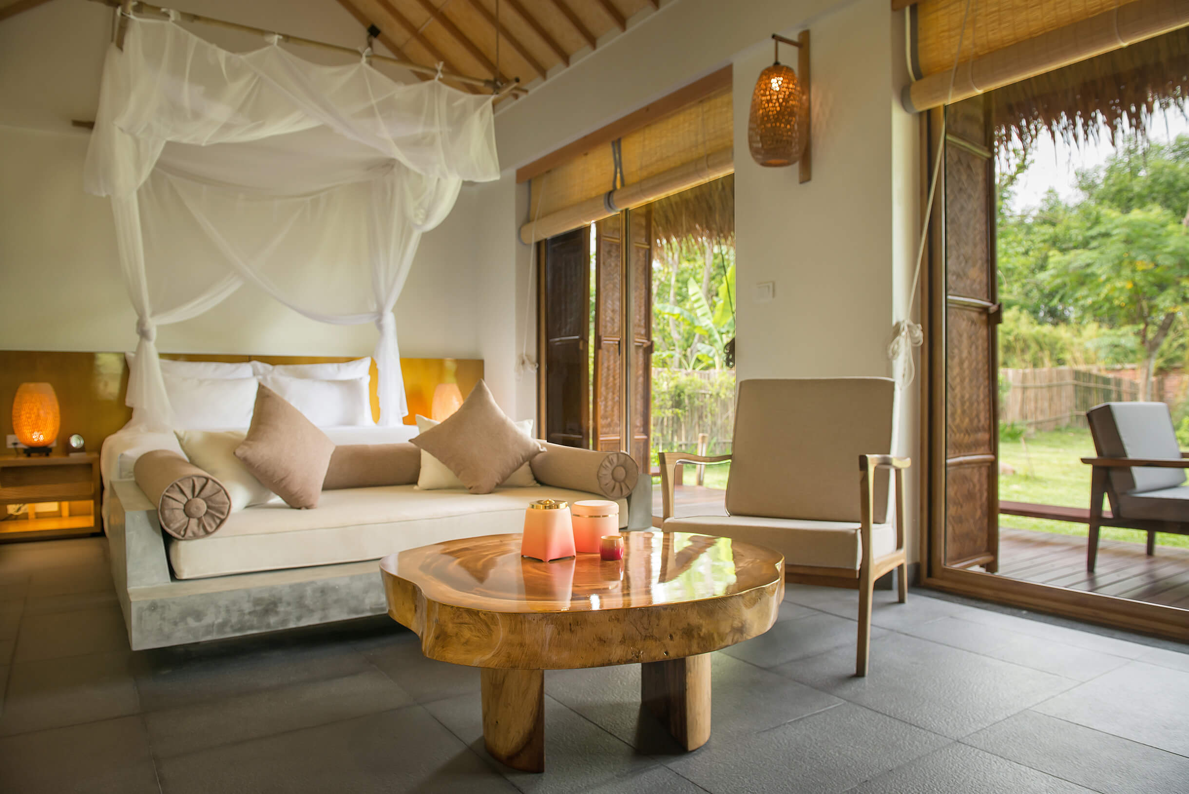 Spacious wellness bungalow living area with terrace at Alba Wellness Valley Hue